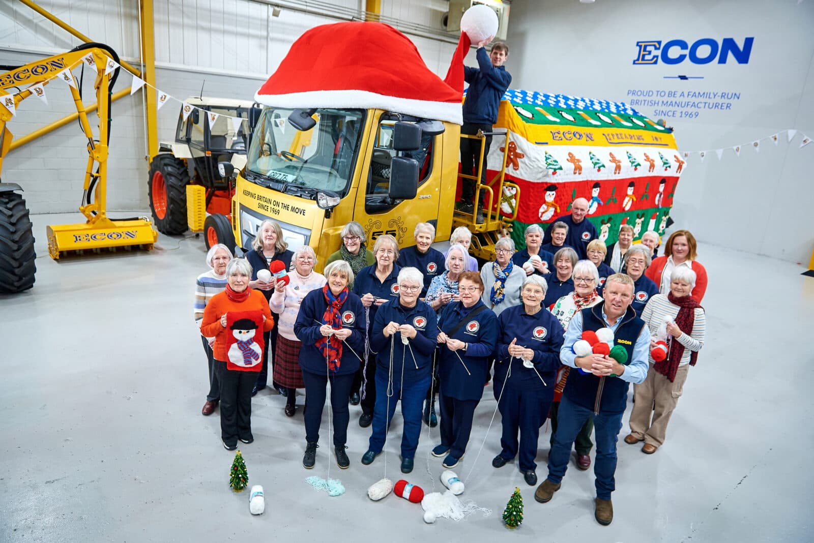 ECON SPREADS JOY WITH GIANT GRITTER JUMPER